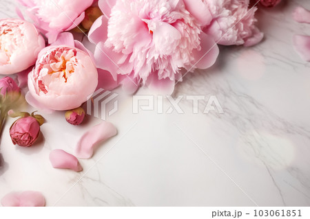 Peonies on marble background with copy space. Abstract natural floral frame layout with text space. Romantic feminine composition. Wedding invitation. International Women day, Mother Day concept Peonies on marble background with copy space. Abstract natural floral frame layout with text space. Romantic feminine composition. Wedding invitation. International Women day, Mother Day concept 103061851