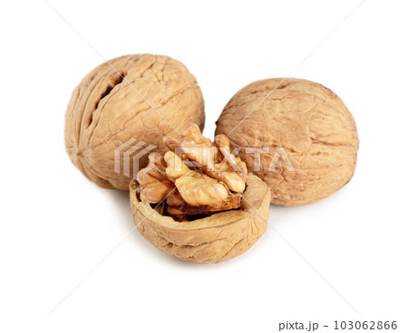 Walnuts isolated on white background Walnuts isolated on white background 103062866