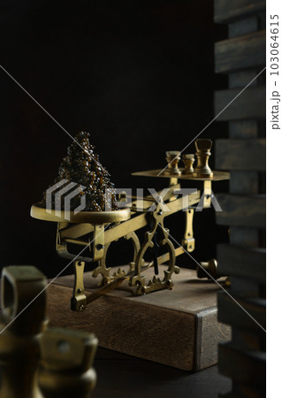 Black caviar. Vintage brass scales. A useful omega. An expensive treat.Brass weights. Black caviar. Vintage brass scales. A useful omega. An expensive treat.Brass weights. 103064615