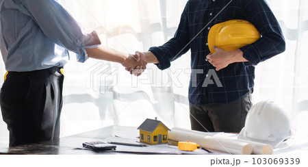engineer team planning design house, modifying plan, creating construction project and addition according to customer requirement 103069339