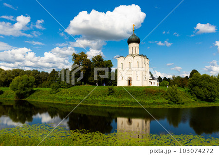 Church of Intercession of Holy Virgin on Nerl River in summertime Church of Intercession of Holy Virgin on Nerl River in summertime 103074272
