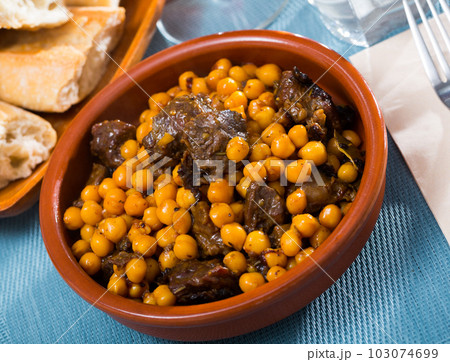 Tasty beef stew with chickpeas closeup Tasty beef stew with chickpeas closeup 103074699