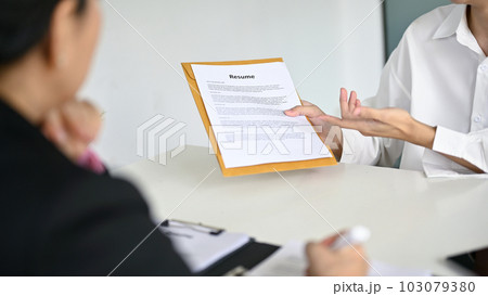 Close-up image of a young male candidate telling about his career experiences Close-up image of a young male candidate telling about his career experiences 103079380