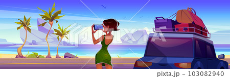 Girl take photo on beach road near car in summer 103082940