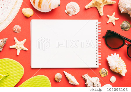 Blank writing book with summer beach accessories on background, copy space. Flat lay with copy space 103098108