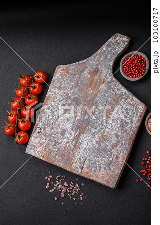 Empty wooden cutting board with cracks and scuffs 103100717