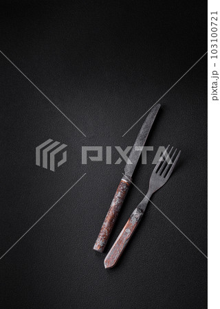 Knife, fork and cutting board, salt, pepper and other ingredients Knife, fork and cutting board, salt, pepper and other ingredients 103100721