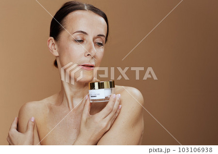 modern woman on beige background 103106938