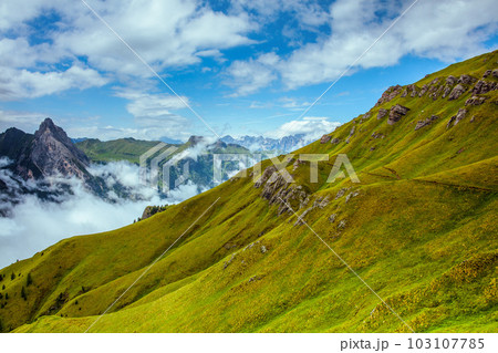 landscape with mountains, hills and clouds landscape with mountains, hills and clouds 103107785