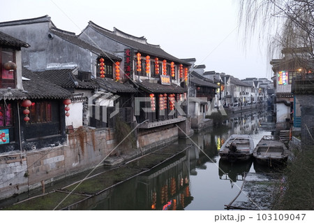 Chinese architecture and buildings lining the water canals to Xitang town in Zhejiang Province, China Chinese architecture and buildings lining the water canals to Xitang town in Zhejiang Province, China 103109047