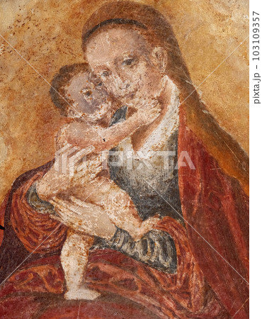 Virgin Mary with baby Jesus painting on house facade in Hallstatt, Austria Virgin Mary with baby Jesus painting on house facade in Hallstatt, Austria 103109357