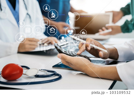 Doctors use a service fee calculator to save money on health insurance, drug cost concepts. 103109532