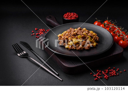 Tasty dish consisting of zucchini, beef meat, mushrooms, onions and garlic Tasty dish consisting of zucchini, beef meat, mushrooms, onions and garlic 103120114