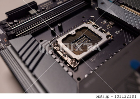 Computer Motherboard with empty and open CPU socket. 103122381