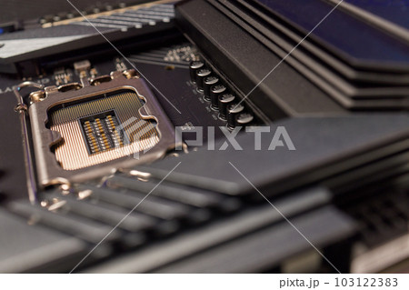 Computer Motherboard with empty and open CPU socket. 103122383