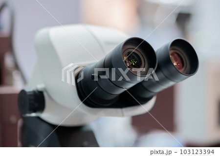 Close up view: ocular lens, eyepieces of optical microscope Close up view: ocular lens, eyepieces of optical microscope 103123394