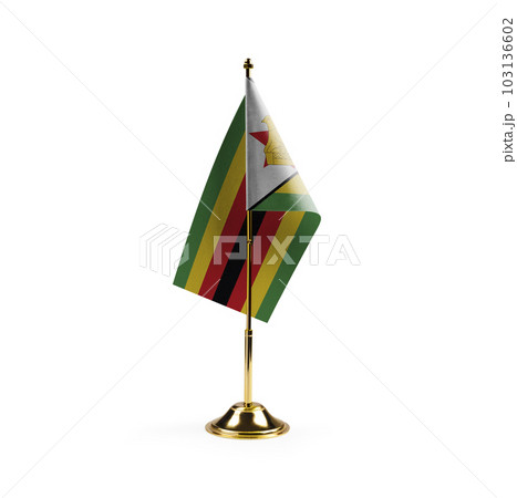 Small national flag of the Zimbabwe on a white background 103136602