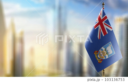 A small Falkland Islands flag on an abstract blurry background 103136753