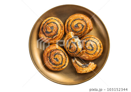 Poppy seed rolls and cardamom buns, Traditional Nordic baked sweet breads on wooden board. Isolated on white background. 103152344