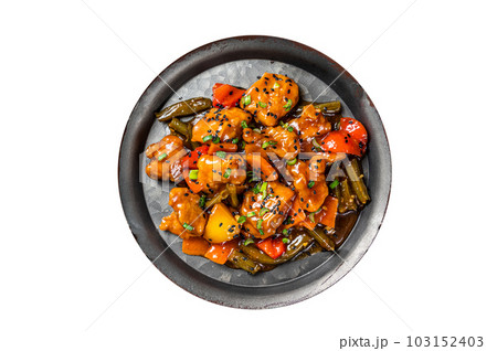 Chicken meat in sweet and sour sauce in a steel tray. Isolated on white background. Chicken meat in sweet and sour sauce in a steel tray. Isolated on white background. 103152403