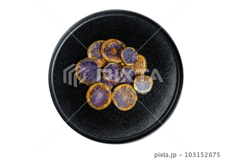 Fried purple potatoes with rosemary. Isolated on white background. Fried purple potatoes with rosemary. Isolated on white background. 103152875