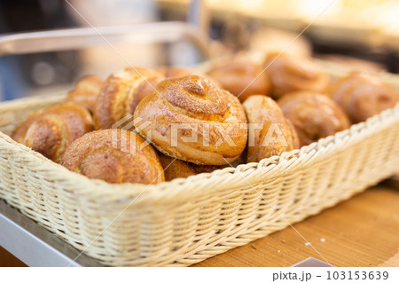delicious fresh butter buns in baskets in bakery 103153639