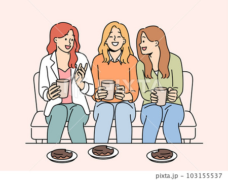 Smiling girls enjoy weekend with desserts at home 103155537