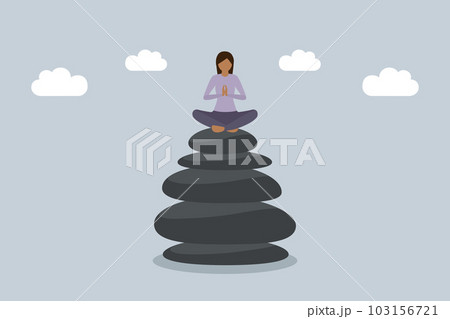 meditating woman sitting on a stack of zen stones work life balance concept 103156721