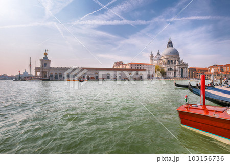 cityscape of Venice with famous Canal Grande and Basilica di Santa Maria della Salute church. 103156736
