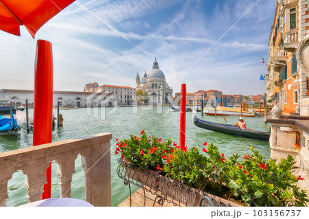 cityscape of Venice with famous Canal Grande and Basilica di Santa Maria della Salute church. 103156737