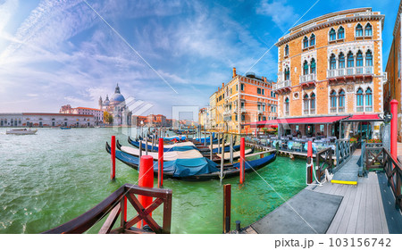 cityscape of Venice with famous Canal Grande and Basilica di Santa Maria della Salute church. 103156742
