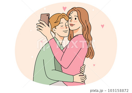 Happy couple cuddle take selfie together 103158872