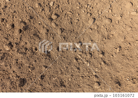 Brown ground surface Brown ground surface 103161072