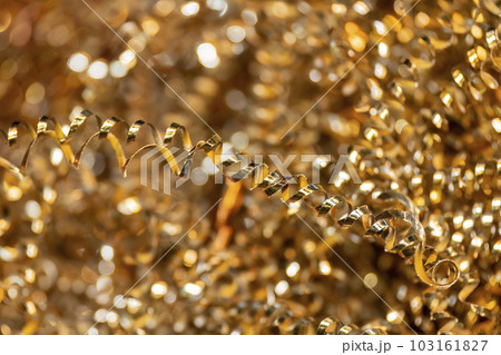 Close-up scene of  brass materials scrap from turning process. 103161827
