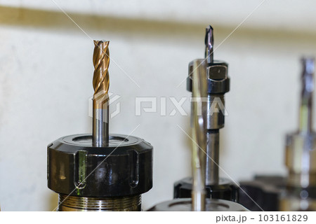 Close-up scene group of the high speed flat end mill for CNC milling machine. Close-up scene group of the high speed flat end mill for CNC milling machine. 103161829