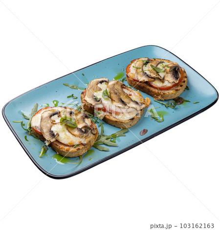 Mushrooms, tomato and mozzarella bruschetta 103162163
