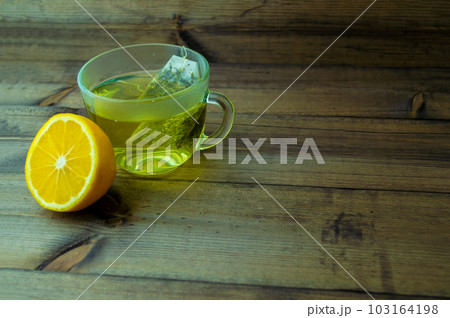 Green tea with lemon. Green tea with lemon. 103164198