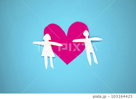 Background with a heart and paper men. 103164425