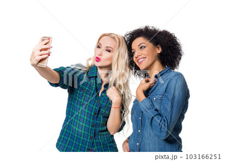 Two beautiful girls making selfie Two beautiful girls making selfie 103166251