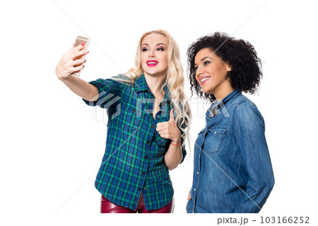 Two beautiful girls making selfie Two beautiful girls making selfie 103166252