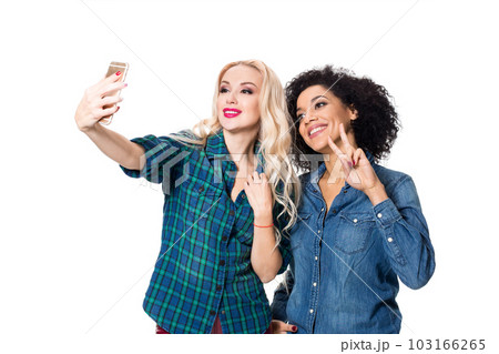 Two beautiful girls making selfie Two beautiful girls making selfie 103166265