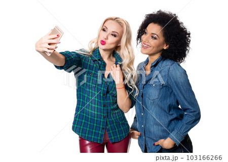 Two beautiful girls making selfie 103166266