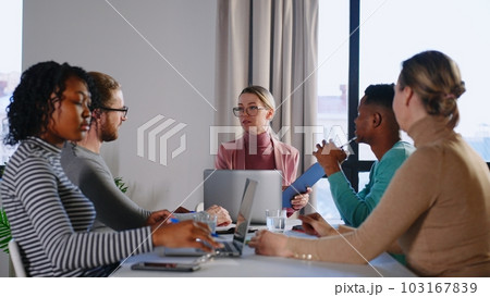 Office workers creative team are talking then doing high-five hand gesture working together . People and brainstorming activities concept. Office workers creative team are talking then doing high-five hand gesture working together . People and brainstorming activities concept. 103167839