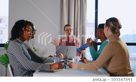 Office workers creative team are talking then doing high-five hand gesture working together . People and brainstorming activities concept. Office workers creative team are talking then doing high-five hand gesture working together . People and brainstorming activities concept. 103167841