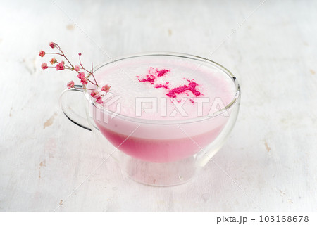 Pink matcha latte with milk. Trendy drink from dragon fruit powder 103168678