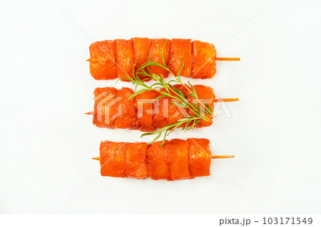 Chicken breast Fillets.Raw marinated chicken fillet skewers on a white background.Marinated Fresh.Closeup of chicken meat.Procurement for designers.Chicken fillet inner skewers.Food concept.Top view. Chicken breast Fillets.Raw marinated chicken fillet skewers on a white background.Marinated Fresh.Closeup of chicken meat.Procurement for designers.Chicken fillet inner skewers.Food concept.Top view. 103171549