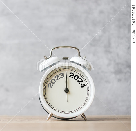 Happy New Year with vintage alarm clock and 2023 change to 2024 number. Merry Christmas, New Start, Resolution, countdown, Goals, Plan, Action and Mission Concept Happy New Year with vintage alarm clock and 2023 change to 2024 number. Merry Christmas, New Start, Resolution, countdown, Goals, Plan, Action and Mission Concept 103176363