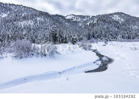 United States, Idaho, Ketchum, Winter landscape with river and mountains 103184292