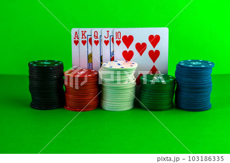 Poker chips in stacks and royal flush.の写真素材 [103186335] - PIXTA