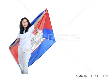 Asian women celebrate Cambodia independence day on 09 November by holding the Cambodia flag 103188426